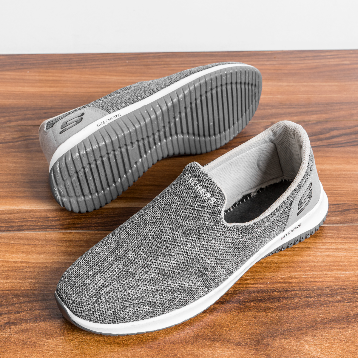 کفش ورزشی اسکیچرز مردانه طوسی مدل Tarok