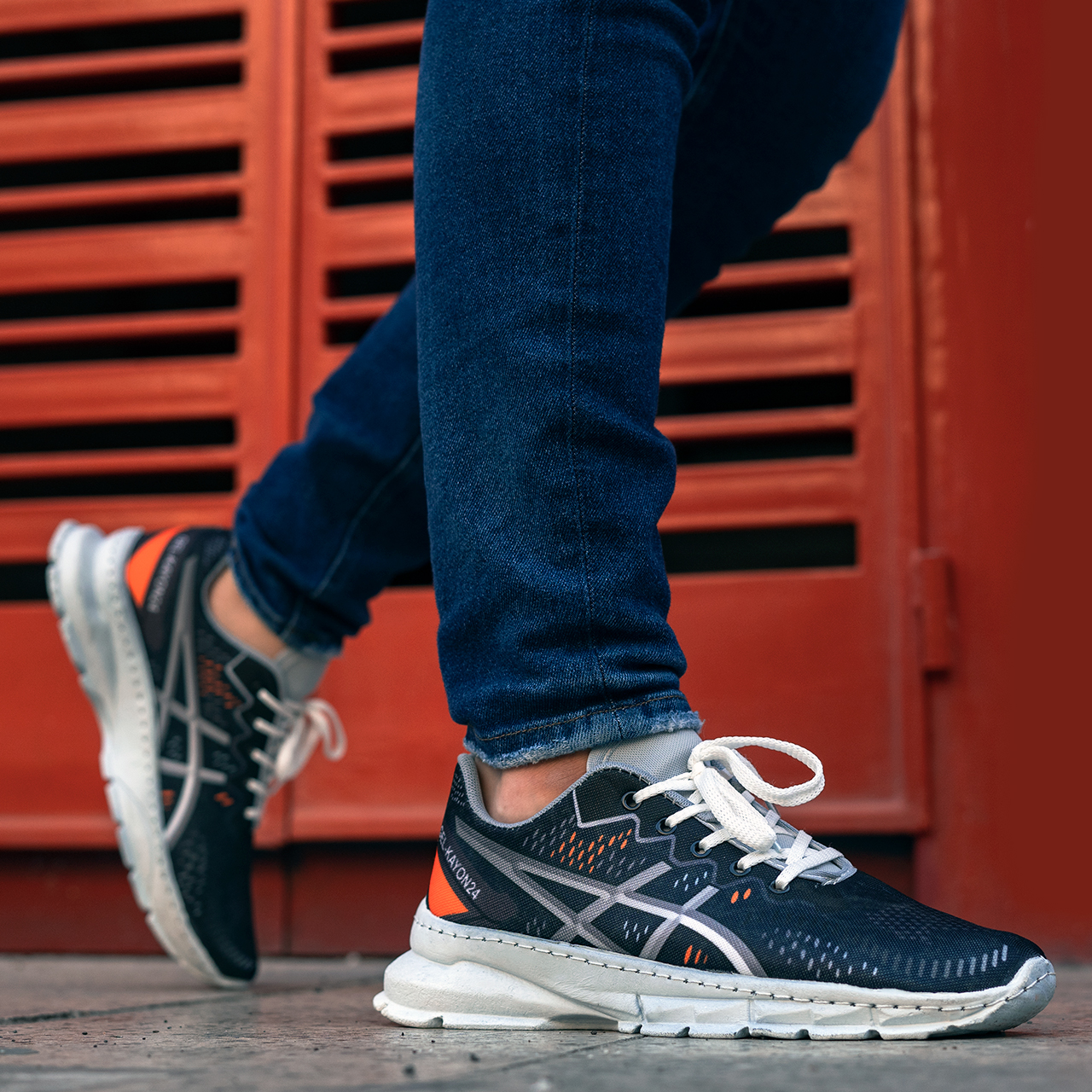 کفش مردانه اسیکس سرمه ای نارنجی مدل dahak