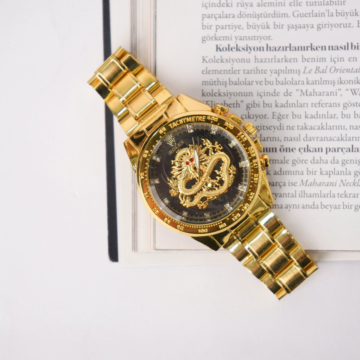 ساعت مردانه طلایی صفحه مشکی مدل DRAGON