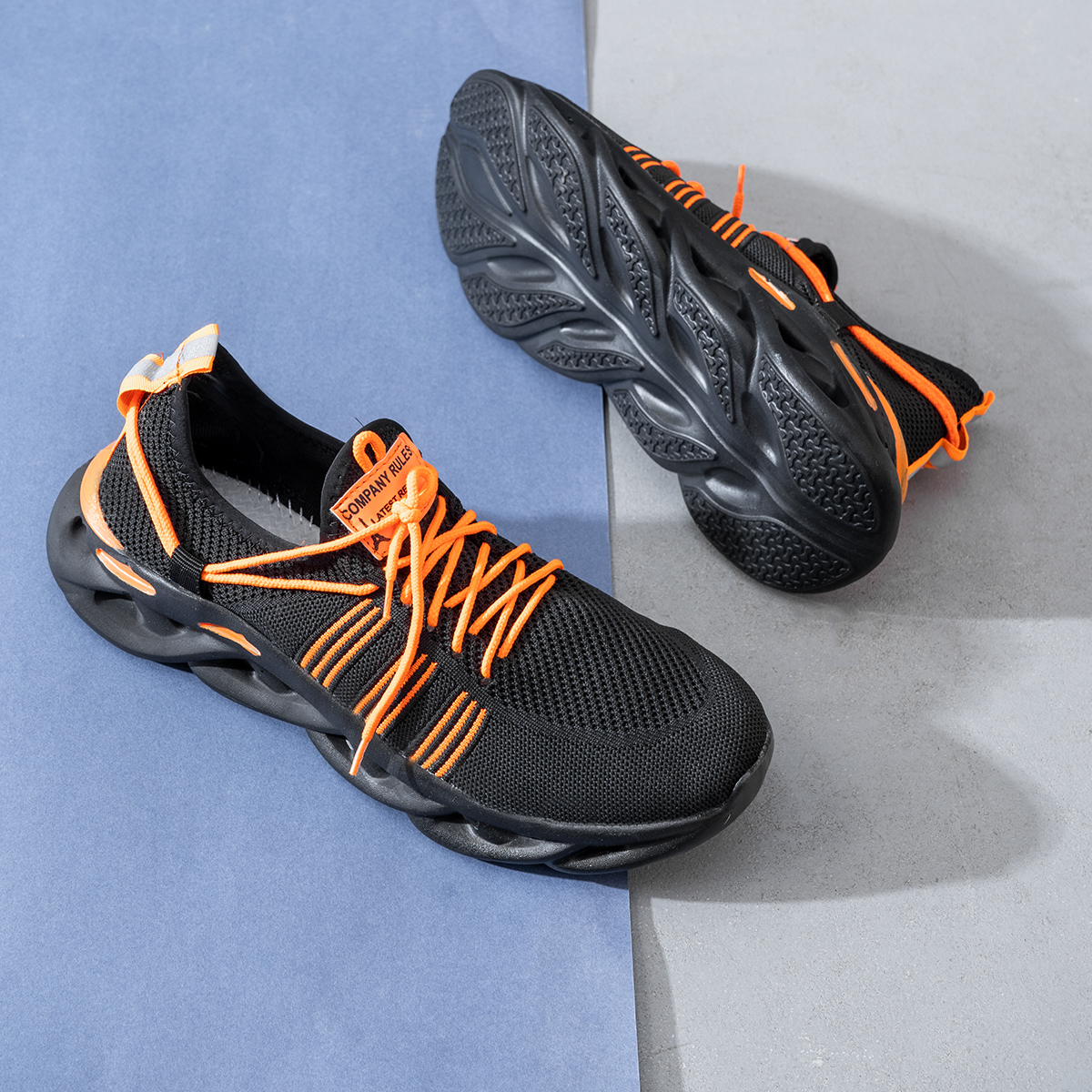 کفش ورزشی مشکی نارنجی مردانه مدل Arisan