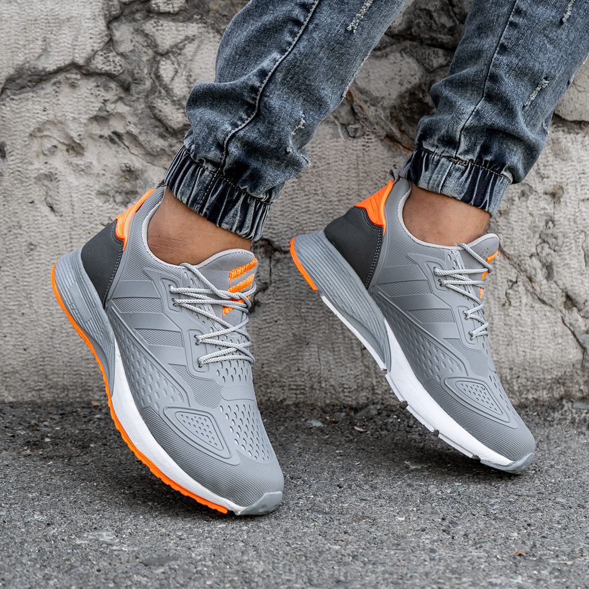 کفش ورزشی Adidas نارنجی طوسی مردانه مدل Ipala