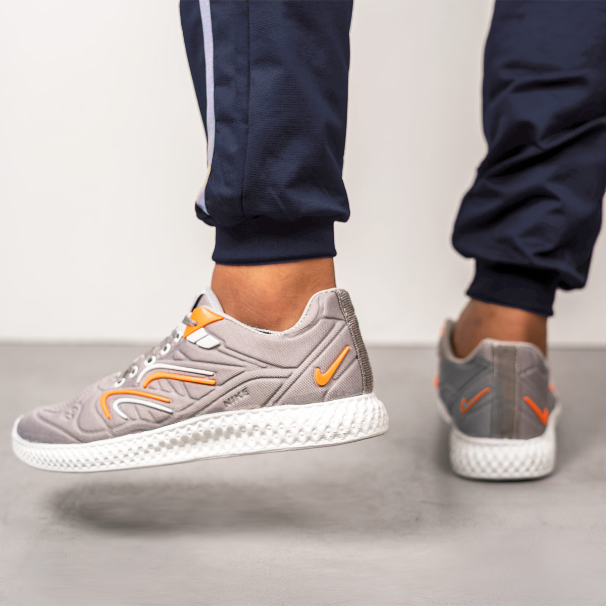 کفش saucony مردانه طوسی نارنجی مدل Delon(T)